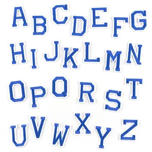 Detailed view of 26 blue and white varsity alphabet embroidery patches for DIY clothing decor.