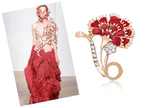 Red enamel carnation brooch detail view, gold-tone zinc alloy with sparkling rhinestones.