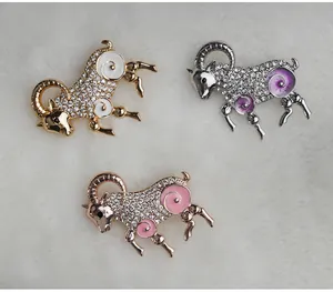 Detailed view of exquisite rhinestone zodiac ram brooches in three metallic colors, premium alloy.