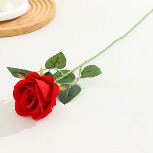 Artificial red velvet single rose flower for home decor, wedding, and Valentine day table setup.