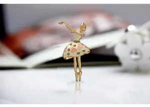Exquisite rhinestone ballerina brooch detail, elegant gold-plated alloy design for chic outfits.