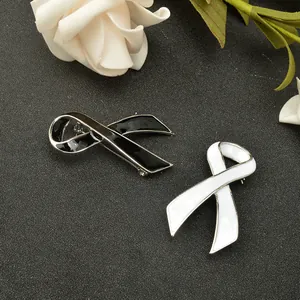 Zinc alloy black white ribbon brooch pin detail, stylish enamel lapel badge accessory.