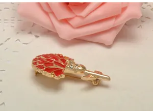 Exquisite red carnation brooch with rhinestones and gold tone finish for gifts.