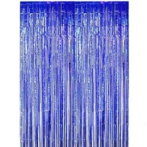 Blue tinsel fringe curtain metallic foil background for party wedding birthday decoration.
