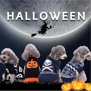 Group of four small dogs wearing festive Halloween themed knitted holiday sweaters