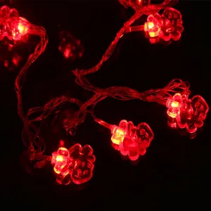 Guirlande lumineuse LED du festival du printemps avec pendentifs rouges Fu pour déco intérieure.