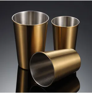 Stainless steel beer cup detail shot showcasing the golden titanium-plated finish and texture.