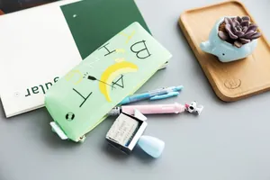 Cute silicone pencil case with banana pattern, triangular student stationery storage bag fresh.