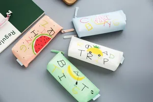 Cute silicone pencil case with fruit pattern, waterproof triangular stationery storage bag for kids.