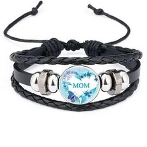Detailed close-up of multilayer black leather bracelet with MOM heart pendant for Mother's Day