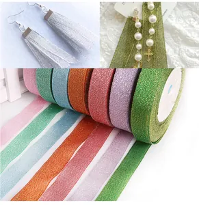 Detail view of colorful metallic glitter ribbons for DIY jewelry and craft decoration