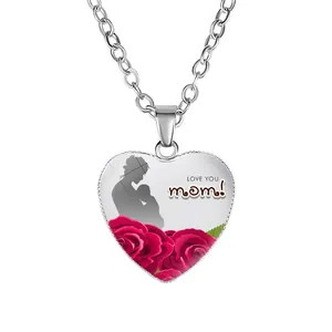 Close-up detail of silver heart pendant featuring mother-child silhouette and red roses