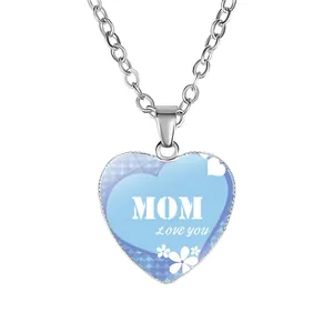 Detailed view of silver heart-shaped pendant necklace with MOM Love you inscription