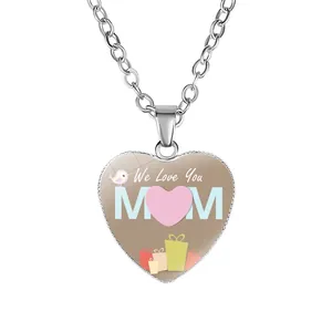 Detailed view of silver heart pendant with 'We Love You MOM' text and gift graphics.