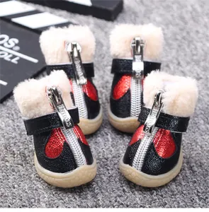 Detailed closeup view of winter warm pet shoes for small dogs, non-slip plush puppy boots.