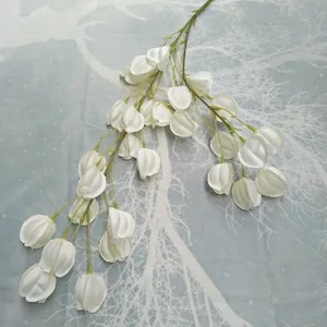 Detailed view of artificial white bell flower branch, perfect for wedding and home decor.