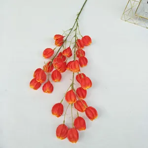 Detailed view of artificial lantern fruit flower branch for wedding and home decoration.