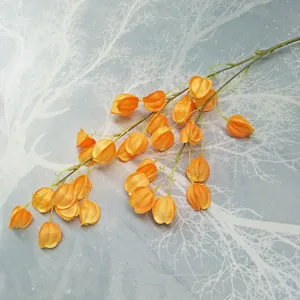 Artificial lantern fruit flower branch detail view, orange simulation floral decor for home.