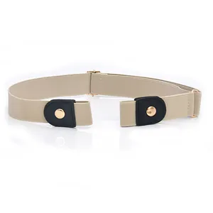 Detail view of elastic buckle-free invisible belt in khaki with black leather tabs and gold hardware.