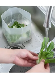 Disposable kitchen sink filter bag standing mesh garbage bag net for food waste drainage.