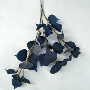Artificial blue leaf branch detail view, perfect for floral arrangement and home decor.