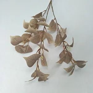 Close-up detail of artificial bodhi leaf branch, perfect for wedding and home decoration.