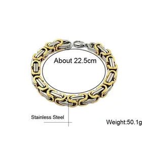 Detailed close-up of a two-tone stainless steel Byzantine chain bracelet with measurements