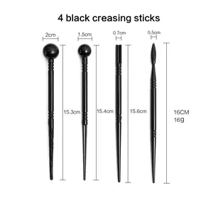 Detailed view of 4 black pottery creasing sticks with size measurements for clay modeling.