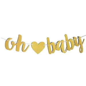 Gold glitter oh baby banner detail view, perfect for baby shower and birthday party decor.