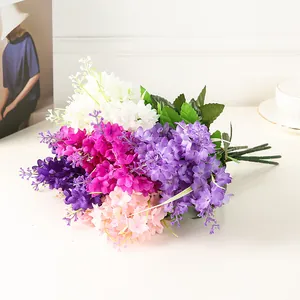 Close-up detail shot of multi-color artificial hyacinth and lavender silk flower bouquet.
