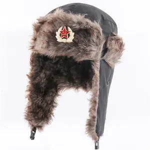 Winter thick men ushanka hat with faux fur earflaps and vintage red star military badge.