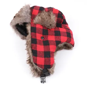 Red black plaid trapper hat with faux fur lining, windproof ear flaps and adjustable chin buckle.
