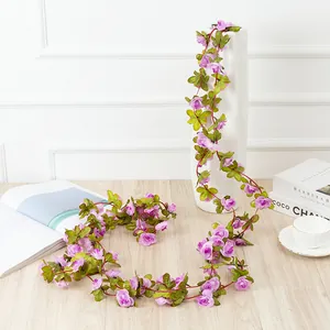 Artificial purple rose flower vine garland for outdoor park wedding home decoration display.