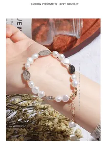Detailed view of an irregular freshwater pearl bracelet with natural quartz crystals