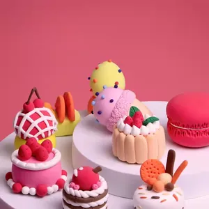 Details of handmade colorful clay miniature cakes set, cute DIY pastries props display.