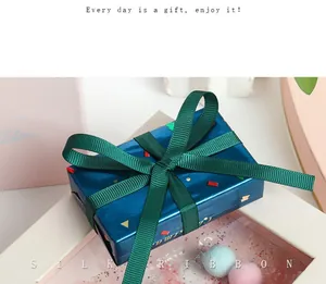 Green grosgrain ribbon for gift wrapping, candy boxes, hair bows, and DIY craft accessories.