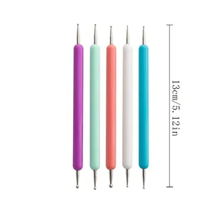 Detail view of dual-ended dotting pen tools with metal balls for mandala and nail art DIY.