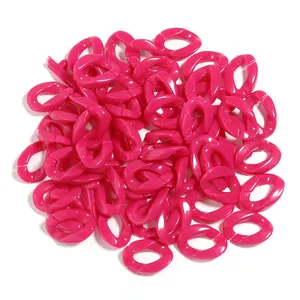 Close up view of hot pink acrylic plastic open chain links for DIY jewelry making parts