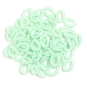 Close-up detail of mint green acrylic open chain links, perfect for DIY jewelry and crafts.