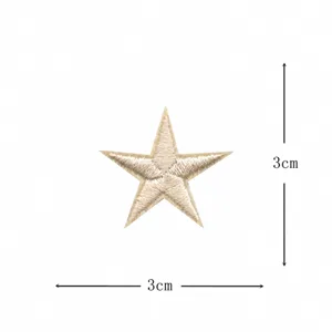 Dettaglio patch ricamo stella d'oro, mini applicazione 3cm per riparazione vestiti fai da te.