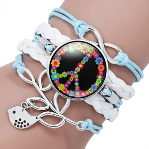 Detailed view of bohemian peace sign multi-layer braided bracelet with infinity charm