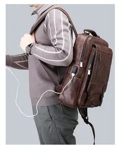 Men casual business PU leather backpack with USB port, stylish daily commuter school bag.