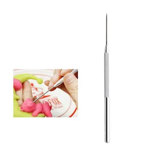 Stainless steel clay detail needle tool with textured grip for pottery and craft sculpting.