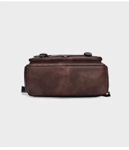 Bottom detail view of the stylish brown PU leather men casual business backpack.