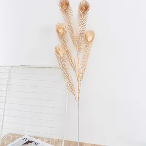Gold artificial peacock feather decorative leaves detail, perfect for home and holiday decor.