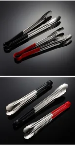 Professional detail of 304 stainless steel food tongs featuring non-slip rubberized handles