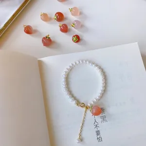 Elegant white pearl choker necklace with red agate peach pendant for women, sweet style