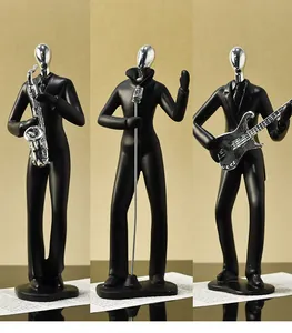 Vista detallada del conjunto de figuras de cantante negro minimalista nórdico para hogar