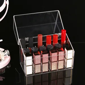 Clear acrylic lipstick organizer makeup storage box with flip lid for cosmetics display.