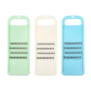 Handheld vegetable grater set in three colors for efficient kitchen food shredding